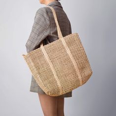 Square-weaved summer office bag. In between summer beach trips when you have to go back to the office, we got you! This chic yet sturdy and functional bag could fit your laptop and more — perfect inspiration for another trip under the sun while you enjoy another week (or four) in the office. Dolores is made from Abaca Fibres with an inner canvas lining and a big inner side pocket for some of your essentials.  This is also equipped with a zipper closure for your piece of mind.  Origin: Bicol Phil Abaca Bag, Bicol Philippines, Piece Of Mind, Dad Jewelry, Summer Office, Brand Magazine, Office Bag, Beach Trips, August Birthstone Jewelry