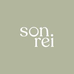 the words son rei are in white on a green background, and there is no image