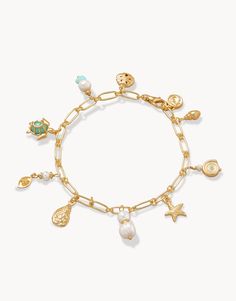 18KT Matte Gold Plated  Adjustable Lobster Clasp Closure  Length 7.5 in - 8 in.   Freshwater & Faux Pearls, Amazonite, Glass Crystals  Semi-Precious  Style #487570 Ocean Charm Bracelet, Ocean-inspired Bracelet With Starfish Charm, Ocean-inspired Starfish Charm Bracelet, Gold Bracelet With Pearl Charm For Beach, Gold Pearl Charm Bracelet For Beach, Gold Pearl Bracelet With Pearl Charm For Beach, Gold Ocean-inspired Jewelry With Dangling Charms, Ocean-inspired Gold Jewelry With Dangling Charms, Ocean-inspired Dangle Charms Jewelry