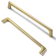 two brass handles on white background