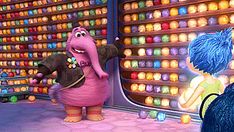 the sesame movie characters are talking to each other in front of an assortment of candy