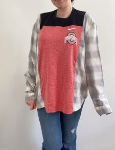 "OSU Ohio State University Reworked Flannel Style: T-shirt x Flannel Crewneck Graphic: OSU Buckeyes Colors: Red, black, gray, and white Details: Pocket, reworked brand/logo SIZE: Best fitting SMALL - MEDIUM All measurements are taken laying flat Pit to pit: 25\" Length: 28\" Model pictured is size small, 5'2, for reference.  This is a sustainable, 1 of 1 product that was upcycled & handcrafted by 2nd hand material.  Madsew'n ♻️ Instagram & TikTok: Madsew.n Fb page: Madsew'n" Casual Reworked Tops For Streetwear, Reworked Flannel, Flannel Style, Osu Buckeyes, Crewneck Graphic, Flannel Fashion, White Details, Ohio State University, 1 Of 1