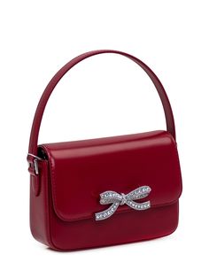 Burgundy leather handbag. Magnet closure. Card holder inside. Removable metal shoulder strap. Glass diamond and rhinestone bow detail. Printed logo on the back. Composition: Outside:, 100% Leather Bovina Lining:, 100% Polyester Finishing:, 100% Vetro -, 100% Polyester Party Shoulder Bag With Palladium Hardware And Top Handle, Evening Rectangular Shoulder Bag With Detachable Bow, Rectangular Evening Shoulder Bag With Detachable Bow, Rectangular Shoulder Bag With Detachable Bow For Party, Party Satchel Evening Bag With Silver-tone Hardware, Evening Satchel Bag With Silver-tone Hardware For Party, Party Evening Satchel Bag With Silver-tone Hardware, Elegant Crossbody Evening Bag With Silver-tone Hardware, Luxury Shoulder Bag With Bow For Party