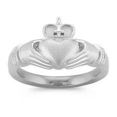 This engaging Claddagh ring is crafted from quality 14 karat white gold with a sandblasted finish.  This traditional Irish ring represents love  loyalty and friendship. Irish Ring, Gold Claddagh Ring, Irish Rings, Claddagh Ring, Irish Design, Claddagh Rings, Platinum Jewelry, Filigree Design, Sapphire Jewelry