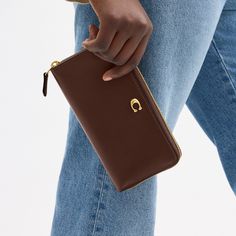 Crafted of refined leather detailed with our Signature hardware this expandable design unzips to reveal a spacious interior. It holds an iPhone X and features 12 card slots two full-length bill compartments and a coin purse to keep essentials organized. | Coach Essential Accordion Zip Wallet - Women's - Brass/maple Luxury Leather Wallet With Zipper Pocket, Luxury Business Wallets With Zipper Pocket, Modern Coach Wallets With Interior Card Slots, Elegant Wallet With Zipper Pocket For Daily Use, Elegant Wallets With Zipper Pocket For Daily Use, Elegant Wallets With Zipper Pocket For Everyday, Luxury Wallets With Zipper Pocket For Everyday, Classic Leather Wallet With Zipper Pocket, Modern Coach Wallet For Everyday Use