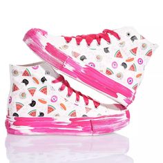 Bring joy with every step in the Mimanera sneakers inspired by the iconic Converse model in collaboration with Alyssa from Silvia & Kids. The unique and playful design features a sweet and delicate pattern on the sides and a fuchsia brushstroke effect platform sole, for a lively and feminine touch. Fuchsia satin laces add a hint of elegance and sophistication to the look. But the real standout feature of these sneakers is the customization option. You can add the initial of your name in the Funky White Round Toe Sneakers, Trendy Custom Sneakers With Rubber Sole, Playful Summer Streetwear Sneakers, Playful Lace-up Summer Sneakers, Playful Summer Lace-up Sneakers, Trendy White Custom Sneakers With Speckled Midsole, Funky White Low-top Sneakers, Cute High-top Custom Pink Sneakers, Fun White Custom Sneakers With Rubber Sole