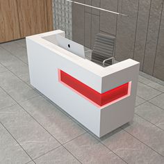 a white reception desk with a red light under the counter and an office chair at the back