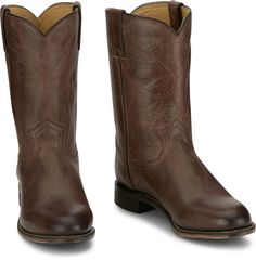 This 10-inch classic Roper boot offers a traditional design with a timeless appeal. Crafted with high-quality leather, it features a rounded toe and a 1-inch heel, providing comfort and durability. The boot's simple yet elegant construction makes it versa Classic Plain Toe Work Boots For Western-themed Events, Classic Moto Boots With Reinforced Snip Toe, Classic Leather Mid-calf Boots, Classic Moto Boots With Snip Toe And Leather Lining, Classic Moto Boots With Moc Toe For Western-themed Events, Classic Moc Toe Moto Boots For Western-themed Events, Classic Boots With Reinforced Heel For Western-themed Events, Classic Moto Boots With Leather Lining And Snip Toe, Classic Brown Snip Toe Waterproof Boots