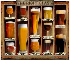 a wooden box filled with lots of different types of beer glasses in it's display