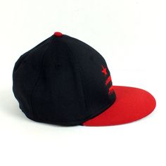 This is our original DC flag Painted Design now on a fitted red and black cap. Also be sure to check out our Trucker and Dad hats. Six-panel Fitted Hat With Logo Patch For Sports Events, Hip Hop Fan Gear Cap, Hip Hop Style Fan Gear Cap, Hip Hop Snapback Baseball Cap For Fan Gear, Hip Hop Snapback Baseball Cap For Fans, Red Fitted Cap For Baseball Season, Red Sports Flat Cap, Red Flat Brim Baseball Cap For Sports Events, Red Flat Cap For Sports