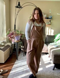 "I love some good overalls, even more, that they are linen! Made to be extra comfy with an oversize fit but still has some flattering snitches at the waist - great for adding layers underneath for the winter. The linen makes it a perfect transition from winter to spring and summer with the lightweight material. Condition: Good condition, no noticeable issues. Measurements are taken with items lying flat on the ground. Please review the measurements closely!   - Waist: 36 - 40in. - In-seam (crotc Cotton Overalls With Side Pockets For Loungewear, Relaxed Fit Overalls With Pockets For Loungewear, Everyday Bib Front Overalls With Pockets, Casual Linen Overalls With Relaxed Fit, Relaxed Fit Overalls For Fall, Brown Utility Overalls For Fall, Relaxed Fit Overalls With Bib Front, Fall Cotton Overalls For Loungewear, Relaxed Fit Overalls With Pockets For Fall