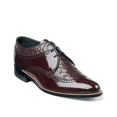 Stacy Adams-Dayton Ostrich Wingtip Oxford Up your style quotient with the Dayton Ostrich wingtip oxford from Stacy Adams. Featuring genuine Goodyear welted construction, this oxford has a synthetic patent upper with cool perforations and ostrich print leather around the collar and vamp for a distinctive look. Burgundy Wingtip Dress Shoes For Semi-formal Occasions, Burgundy Plain Toe Dress Shoes For Semi-formal Occasions, Semi-formal Burgundy Plain Toe Dress Shoes, Classic Burgundy Oxfords With Plain Toe, Classic Burgundy Wingtip Dress Shoes, Classic Burgundy Dress Shoes For Formal Occasions, Classic Burgundy Lace-up Oxfords, Fitted Moc Toe Semi-formal Oxfords, Semi-formal Burgundy Wingtip Dress Shoes