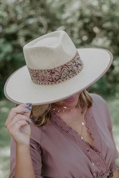 The Wilder Wool Rancher Hat – where rustic meets urban. Crafted from durable wool, it's your go-to for timeless style, whether in the city or out exploring. Elevate your look with a touch of adventure. Vintage Wool rancher with decorative band Adjustable inner velcro strap for sizing and lining. 10cm brim length Beige Wide Brim Felt Hat For Outdoor, Bohemian Wide Brim Wool Felt Hat, Adjustable Bohemian Wool Hat, Bohemian Wool Fedora Felt Hat, Adjustable Wool Hats For Spring, Country Style Beige Hat Bands For Travel, Bohemian Wool Felt Hat With Short Brim, Bohemian Wool Adjustable Hat Bands, Bohemian Wool Brimmed Hat Bands