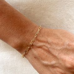 Dainty and perfect as a stackable option. 18k Gold Filled Short Link Paperclip Bracelet Metal : 18k Gold Filled Link size: 3 mm wide x 8 mm long Available sizes: 6 inches 7 inches and 7 inches with 2 inches extender. Hypoallergenic jewelry - Nickel Free Water-resistant Rigorously manufactured under CA Prop 65 and EU standards Handcrafted in Brazil. Dainty Gold Paperclip Bracelet Stackable Gold Link Bracelet Short Link Paperclip Bracelet 18k Gold Filled Bracelet Delicate Gold Chain Bracelet Stackable Paperclip Jewelry Hypoallergenic Gold Bracelet Waterproof Paperclip Bracelet Elegant Short Link Bracelet Handcrafted Gold Filled Bracelet Versatile Stackable Bracelet Everyday Wear Gold Bracelet Statement Paperclip Bracelet Fashionable Gold Link Bracelet Gift-Worthy Gold Filled Bracelet Minimal Prayer Ring, Paperclip Bracelet, Gold Link Bracelet, Bracelet Metal, Hypoallergenic Jewelry, Stackable Bracelets, Gold Bracelet Chain, Birthstone Charms, Metal Bracelets