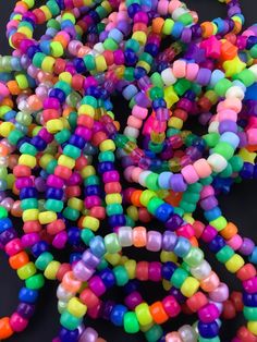 Add that finishing touch to any rainbow outfit with some rainbow kandi!  Select as many as you would like and we will send you a random assortment of the styles pictured here.  If you have a preference between pastel and neon let us know and we will keep it in mind. But please note the assortment s random Multicolor Beaded Rave Friendship Bracelets, Handmade Multicolor Rave Friendship Bracelets, Cute Colorful Plastic Beaded Bracelets, Multicolor Beaded Friendship Bracelets For Rave, Rave Style Multicolor Friendship Bracelets With Letter Beads, Rave Style Multicolor Beaded Friendship Bracelets, Playful Multicolor Plastic Friendship Bracelets, Rainbow Beaded Bracelets For Rave, Rainbow Beaded Bracelets For Friendship Rave