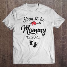 Soon To Be Mommy Mothers Day For Mom Pregnancy T-Shirt, Mother’s Day Shirts, Happy Mothers Day Shirts The T-Shirt, a timeless wardrobe staple, combines comfort with effortless style. Crafted from soft, breathable fabrics, it ensures a cozy fit for everyday wear. Its versatility makes it a go-to choice for various occasions, from casual outings to... Mommy Daddy Shirt, First Time Grandma, First Time Dad, New Grandma, Mothers Day T Shirts, Funny New, Timeless Wardrobe Staples, Pregnancy Shirts, Mothers Day Shirts