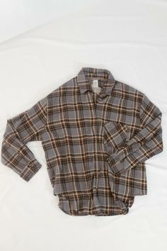 Brown Checkerd Shirt, Cheap Vintage Flannel Shirt With Buttons, Fall Collared Tops With Snap Cuffs, Plaid Long Sleeve Top With Button Closure, Plaid Long-sleeve Top With Button Closure, Fall Collared Shirt With Button Cuffs, Oversized Brown Shirt With Button Closure, Oversized Tops With Roll-up Sleeves For Fall, Fall Blouse With Roll-up Sleeves