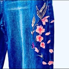 Great Style Of Mid-Rise Jeans Floral Butterfly Embroidery Design On One Leg, Five Pockets, Zip Up, Button Closure, Relax Fit Distressed Regular Cut Denim Jeans! Great Year-Round Fashion Finds! Measures Approximately Women’s Size:10 32x30 Waist 32” Rise 9.5” Inseam 30” Material: 98% Cotton, 2% Elastane Upc1581529 Denim Mid-Rise Embroidered Detailing In Pink White Floral And Butterfly Down Leg Distressed Relax Cut Jeans! Dark Wash Floral Embroidery Jeans For Spring, Spring Floral Embroidered Dark Wash Jeans, Spring Embroidered Dark Wash Jeans, Trendy Medium Wash Jeans With Floral Embroidery, Trendy Blue Jeans With Floral Embroidery, Spring Jeans With Multicolor Embroidery, Blue Denim Jeans With Floral Embroidery, Spring Embroidered Denim Jeans, Floral Embroidered Jeans In Denim