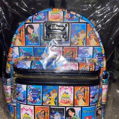 Under The Sea Collectibles Disney Vhs Mini Backpack. Ready To Ship Immediately Multicolor Backpack For Disney Fan Events, Black Backpack For Theme Parks, Black Backpack For Theme Park, Multicolor Backpack For Theme Park, Black Disney Style Bag For Theme Park, Themed Bags With Character Print For Disney Trips, Themed Character Print Bags For Disney Trips, Character Print Backpack For Everyday Use, Black Disney Bag For Theme Park