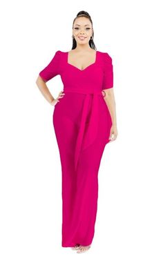 This elegant Curvy Style Fuschia Jumpsuit features a sweetheart neckline and keyhole back for a flirty touch. The attached belt accentuates your curves, making it a flattering and stylish choice. Perfect for any occasion, this jumpsuit is a must-have for your wardrobe. All Sales are Final Model Wearing 1x Elegant Belted Jumpsuit For Date Night, Elegant Fitted V-neck Jumpsuits And Rompers, Elegant Belted Jumpsuits For Night Out, Fitted Belted Jumpsuits And Rompers In Solid Color, Fitted Solid Color Belted Jumpsuits And Rompers, Solid Color Belted Fitted Jumpsuits And Rompers, Elegant Jumpsuits And Rompers With Sweetheart Neckline For Party, Elegant Pink Stretch Jumpsuits And Rompers, Fitted Belted Jumpsuits And Rompers For Date Night