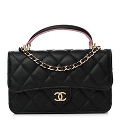 This is an authentic CHANEL Lambskin Quilted Flap Phone Holder With Chain in Black and Lilac. This chic mini crossbody classic is crafted of quiltedlambskin leather in black. The bag features a leather top handle, a gold chain link leather-threaded shoulder strap and a facing gold CC logo. The front flap opens to a pink leather interior with zipper and patch pockets. Black Diamond-quilted Evening Bag, Black Diamond Quilted Evening Bag, Black Evening Bags With Diamond Quilting, Black Bags With Diamond Quilting For Evening, Chanel Crossbody, Coco Handle, Chanel 19, Chanel Tweed, Chanel Shoulder Bag