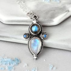 This mystical and celestial necklace will add a touch of magic to your look! Made with Labradorite and Moonstone gems, this sterling silver necklace features crescent moons and stars inspired by the cosmos. Labradorite can symbolize self-love, spiritual protection and intuition. As well, Moonstone can symbolize the divine feminine, clarity, intuition and the moon phases. *Our jewelry features natural, genuine gemstones, ensuring each piece is unique and one-of-a-kind. Please note that, as no two The Moon Phases, Moons And Stars, Moonstone Ring Sterling Silver, The Divine Feminine, Celestial Necklace, Spiritual Protection, The Cosmos, Beautiful Rainbow, Divine Feminine