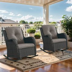 two rocking chairs sitting on top of a wooden floor