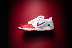 An ode to the era in which the brand was born, Supreme applies a decidedly ‘90s vibe to their their latest collaboration with Nike SB. Complete with a jewel Swooshes and a two-toned upper, the Dunk Low features of-the-time Air Force 1 Mid aesthetics. Pack And Play, Air Force 1 Mid, Red Jewel, Sb Dunk Low, Nike Sb Dunks Low, Nike Brand, Star Logo, Nike Sb Dunks, Stadium Goods