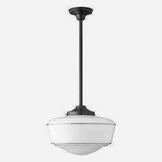 a black and white light hanging from a ceiling fixture