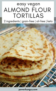 three tortillas stacked on top of each other with text overlay reading easy vegan almond flour tortillas