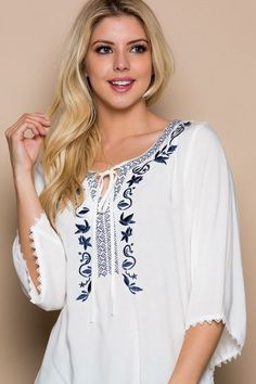 This breezy modern boho top is featuring a embroidered neckline, embroidery detail and lace on sleeves and hem. The perfect vacation and summer top! 100% rayon length about 26,5” in size L navy blue floral embroidery bottom front lace hemline sleeves lace hemline Size Numeric Size Bust Waist Hip S 2-4 32” - 34" 28”- 30" 37”- 39" M 4-6 34” - 36" 30”- 32" 39”- 41" L 8-10 36” - 38" 32”- 34" 41”- 43" Summer Embroidered Long Sleeve Top With Lace Trim, Summer Long Sleeve Embroidered Top With Lace Trim, Bohemian Rayon Tops With Floral Embroidery, Bohemian Rayon Top With Floral Embroidery, Flowy Floral Embroidered Beach Tops, Flowy Floral Embroidered Tops For Beach, Summer Rayon Blouse With Floral Embroidery, Bohemian Tops With Embroidered Sleeves For Vacation, Flowy Vacation Tops With Floral Embroidery