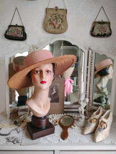 "This is the most fabulous wide brimmed vintage straw hat trimmed with a very wide grosgrain ribbon and bow which has faded quite beautifully from the original shade. It`s in great condition and comes from the world famous Liberty of London. It dates to c1940s. As you can see, this hat makes an absolutely wonderful display but it remains in very wearable condition although it is quite a petite size. You could trim the ribbon with vintage flowers if you liked too but it`s simple form is so pleasi Vintage Pink Sun Hat For The Beach, Vintage Straw Boater Hat With Short Brim, Vintage Pink Beach Hat, Vintage Brimmed Boater Hat For Spring, Vintage Curved Brim Sun Hat For Kentucky Derby, Vintage Brimmed Straw Hat For Vintage Events, Vintage Boater Hat For Spring, Vintage Brimmed Straw Hat, Vintage Brimmed Straw Hat For Events