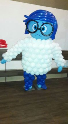 an inflatable balloon character is standing on the floor