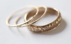 Handmade floral wedding / engagement wide band in 14k gold-filled. Handmade in your customized size. It can be worn alone, or as a part of an engagement / wedding stackable set.  Set of 3  1xfloral pattern 14k gold-filled band 1xlightly hammered 14k gold-filled ring 1xnotched 14k gold-filled ring Available in *925 sterling silver *14k Gold-filled Gold Stackable Jewelry With Wide Band, Elegant Wedding Jewelry With Thick Band, Elegant Thick Band Jewelry For Weddings, Elegant Thick Band Wedding Jewelry, Gold Jewelry With Engraved Thick Band, Gold Engraved Thick Band Jewelry, Heirloom Wide Band Engraved Jewelry, Vintage 14k Gold Stackable Jewelry, Elegant Wide Band Wedding Bands