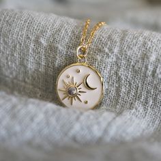 "Dainty moon and star charm necklace made of white enamel clear CZ stonemason and star pendant with skinny gold plated brass chain. Sweet and soft. A perfect gift for birthdays, anniversaries, bridesmaids, graduation, friendship, sisters, and for you! All items are packed individually in a gift box :) ★ Chain length 14\" - 20\" ★ Pendant 3/4\" ★ Gold filled pendant / Gold plated brass chain /White enamel / Cubic Zirconia  ★ Our production time is 1-4 business days ★ ★See more Nalydia jewelry  www.nalydia.etsy.com" Necklace Star, Necklace Moon, Star Charm Necklace, Etsy Bridesmaid Gifts, Moon And Star, Moon Necklace, Star Charms, Brass Chain, Star Pendant