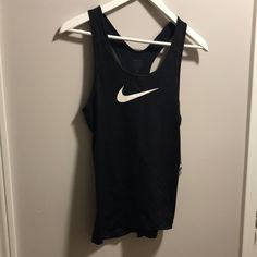 Great Condition Sporty Black Elastane Tank Top, Black Tank Top Sportswear, Black Elastane Racerback Tank Top, Black Racerback Elastane Tank Top, Sports Racerback Top Made Of Elastane, Elastane Racerback Sports Top, Black Fitted Moisture-wicking Tank Top, Black Elastane Workout Tank Top, Fitted Black Moisture-wicking Tank Top