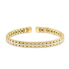 Inspired by the enchanting Italian region, the Venetian Box link endures as a testament to the skilled artisans who continue to craft it today. Crafted from real 14K gold, this bracelet features two rows of interlocking yellow gold links, with a white gold bar in the middle, hand polished for high shine. This is a cuff-style bracelet and can work easily without the fuss of a clasp. The bracelet is slightly flexible and molds to most average wrist sizes for both men and women. This piece will be Modern White Bracelets With Solid Link Construction, Timeless White Bracelet With Polished Finish, Timeless White Bracelets With Polished Finish, White Timeless Bracelets With Polished Finish, Modern White Chain Bracelet For Formal Occasions, Formal White Jubilee Cuff Bracelet, Elegant White Bracelet With Solid Link Construction, The Venetian, Gold Bar