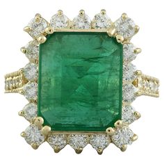 6.91 Carat Natural Emerald 14 Karat Solid Yellow Gold Diamond Ring Stamped: 14K Total Ring Weight: 9.2 Grams Emerald Weight: 5.51 Carat (13.00x11.00 Millimeters) Diamond Weight: 1.40 Carat (F-G Color, VS2-SI1 Clarity ) Quantity: 28 Face Measures: 19.20x16.30 Millimeters SKU: [600097] Emerald And Diamond Ring, Yellow Gold Diamond Ring, La Face, Gold Diamond Ring, Lovely Ring, Engagement Anniversary, Gold Diamond Rings, Natural Emerald, Solid Yellow