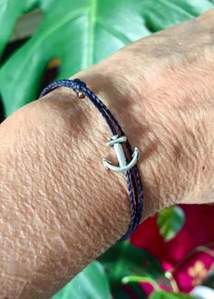 Simple and easy to wear deep ocean blue anchor bracelet. Adjustable, great for men and women. Handmade with care.  perfect for sailors, surfers, ocean lovers and watermen and waterwomen 💙 the cord is 100% waterproof so leave on to swim and surf! comfortable and easy to wear PLEASE MESSAGE ME FOR LARGER QUANTITY OR DIFFERENT COLORS OR SIZES!  SEE ALL MY BRACELETS AND ANKLETS HERE: https://www.etsy.com/shop/LOphoto808?ref=l2-shopheader-name§ion_id=19725982 please contact me here: https://www.etsy Adjustable Anchor Bracelets For Beach, Adjustable Blue Nautical Bracelets, Nautical Blue Bracelets For Gifts, Nautical Blue Bracelets As A Gift, Adjustable Blue Nautical Bracelet, Blue Nautical Bracelets For Gift, Blue Nautical Bracelets As Gifts, Navy Nautical Adjustable Bracelets, Adjustable Navy Nautical Bracelet