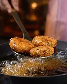 some food is being cooked in a frying pan