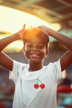 Make your little one's wardrobe pop with our Cute Kids' T-Shirt featuring adorable cherry graphics on the chest! This fun and vibrant tee is perfect for adding a touch of sweetness to their everyday style. Crafted from soft and breathable cotton fabric, this t-shirt ensures all-day comfort for your child. Whether they're playing in the park, attending a birthday party, or relaxing at home, this tee is both comfy and stylish. The cherry graphics add a playful and cheerful element to the t-shirt, making it a hit with kids who love fun designs. Pair it with jeans, shorts, or leggings for a cute and casual look that's perfect for any occasion. Available in a variety of sizes to fit different age groups, our Cute Kids' T-Shirt with Cherry Graphics is a must-have addition to their wardrobe. Let Red T-shirt For Summer Gift, Cherry Short Sleeve Tops For Summer, Family Matching Red T-shirt For Summer, Red Summer T-shirt As A Gift, Red T-shirt For Birthday In Summer, Playful Summer T-shirt For Gift, Playful Summer T-shirt As A Gift, Playful Summer T-shirt As Gift, Playful Summer T-shirt Gift