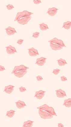 pink lips on a white background with lots of smaller ones in the air and one is slightly open