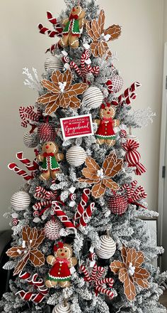 a christmas tree decorated with gingerbread cookies