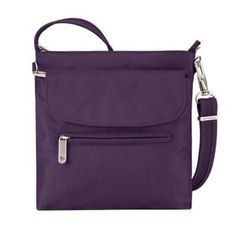 Travelon's Anti-Theft Mini Shoulder Bag is lightweight and boasts a lockable, zippered main compartment. Featuring multiple internal pockets and ample room for everything you need to carry on your journey. Adjustable cut-proof shoulder strap with front and rear exterior pockets provide additional storage space. Color: Purple. Travelon Bags, Travel Collection, Purple Bags, Mini Shoulder Bag, Luggage Accessories, Classic Mini, Anti Theft, Large Bag, Online Bags