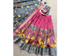 Designer lehenga choli Kalamkari lehenga for women South indian lehenga 3pc set indian lengha Traditional outfit festival lehenga set 🌷Lehenga Choli🌷 Subtle shades, bold heritage: Kalamkari Dola silk charm 🪸 Lehenga(Stitched) Lehenga Fabric : Dola Silk Lehenga Work : Kalamkari Print With Zari Weaving Border  Waist : SUPPORTED UP TO 42 Lehenga Stitching : Stitch With Canvas  Lehenga Closer : Drawstring With Zip Length : 41 Flair : 3.80 Meter  Inner : Micro Cotton Blouse(Unstitched) Blouse fabr Bohemian Fitted Lehenga With Bandhani Print, Fitted Bohemian Lehenga With Bandhani Print, Fitted Bohemian Bandhani Print Lehenga, Fitted Kalamkari Print Sets For Diwali, Semi-stitched Dupatta Set With Long Skirt, Fitted Anarkali Set With Kalamkari Print For Festive Season, Sharara With Kalamkari Print For Festivals, Semi-stitched Long Skirt Sets With Dupatta, Diwali Art Silk Long Skirt Set