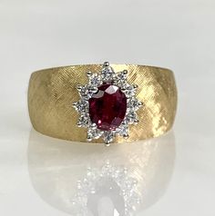 ruby ring, ruby vintage ring, ruby vintage, 14k gold ring, 14k ring women, 14k ruby ring, vintage ruby ring, ruby diamond ring, ruby vintage A Charming vintage ruby ring featuring an oval cut center stone weighing 0.67 carats complemented by sparkling white diamonds weighing 0.24 carats set in 14k brushed yellow gold. *Ring size: US 6 1/4 *Ring weight: 6.89 Grams *Center stone dimensions: 5.3X4.3mm Fine Jewelry Red Diamond Ring Stamped 14k, Heirloom Ruby Birthstone Ring, Classic Ruby Diamond Ring Stamped 14k, Oval Ruby Cluster Ring Stamped 14k, Oval Diamond Ruby Ring Stamped 14k, 14k Gold Ruby Ring With Rose Cut Diamonds, Oval Ruby Ring With Diamond And 14k Stamp, Heirloom Ruby Ring With Diamond Accents, Heirloom Ruby Ring