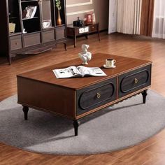 a living room with a coffee table and two end tables on the carpeted floor