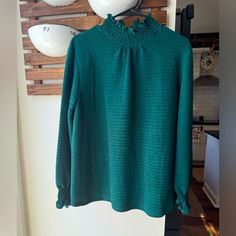 Boutique Hunter Emerald Green Mock Neck Ruffle Long Sleeve Blouse Large Nwot Green Ruffled Winter Tops, Green Ruffled Tops For Winter, Winter Green Ruffled Tops, Long Sleeve Tops With Ruffle Hem For Work, Crew Neck Blouse With Ruffles For Brunch, Casual Green Top With Ruffled Collar, Casual Green Tops With Ruffled Collar, Green Top With Ruffled Collar And Details, Green Ruffle Sleeve Tops For Fall