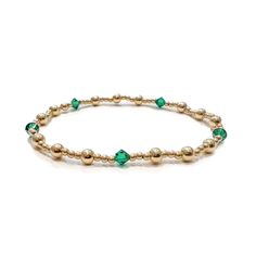 Hey May girlies! You just found a personal piece of jewelry to add to your daily stack! Wear your own emerald birthstone or pair with another to represent your kids, partner or family member! Stretch Bracelet, Roll onto Wrist 14k Gold-filled Beads Genuine Emerald Swarovski Crystal Bicone Beads Approximately 6.5 inches Handmade in the USA by Kinj Collective Shop the entire Beaded Birthstone Collection Emerald Birthstone, Birthstone Bracelet, Birthstone Bracelets, Accessories Rings, Stretch Bracelet, Ring Bracelet, Stretch Bracelets, Handbag Accessories, Swarovski Crystal