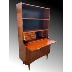 an art deco desk and hutch with drawers